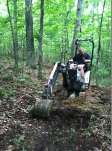 Brock and his mini excavator doing some magic. 